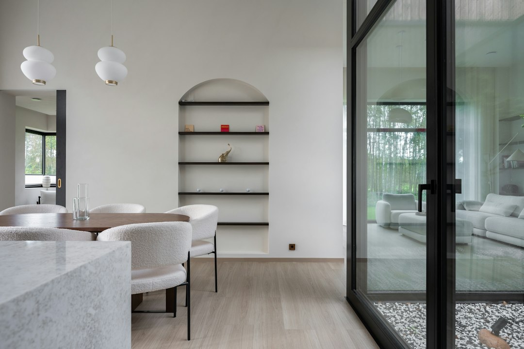 Minimal wooden wall switches made from thermowood, bringing a natural material into modern interior design.